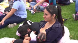Hundreds of Colombian mothers breastfeed in public