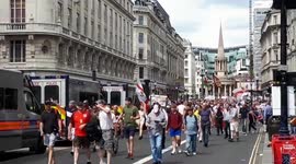 Tommy Robinson supporters march in central London