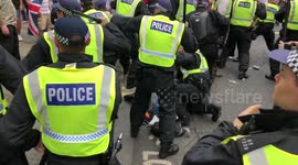 Tommy Robinson supporters clash with police in central London