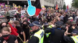 Violence erupts in Central London at 'Free Tommy' protest