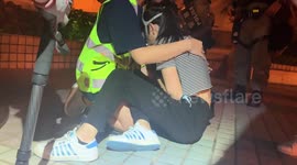AUGUST 4: 'I'm so scared!' Weeping teenage girl calls mom moments before Hong Kong riot police haul her away