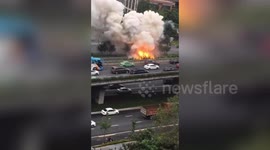 Smoke pours out of van after it explodes on road in China's Chengdu