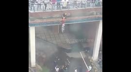 Dramatic moment student foils woman's suicide attempt in India