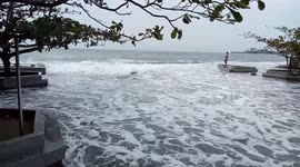Huge waves break on beach as Tropical Storm Hanna hits the Philippines