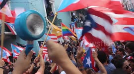 Protesters say goodbye to the former Governor of Puerto Rico in a very culturally united way.