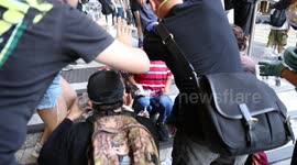 Hong Kong protestors rush to aid of mother and two young children affected by tear gas