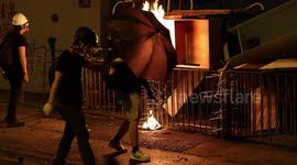 Hong Kong protestors start fire at police station as fire department rushes to extinguish it