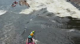 SUP paddlers crashes into Ottawa River Wave, flies off board