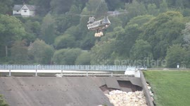Footage captures moment RAF Chinook drops sandbags into damaged Whaley Bridge dam