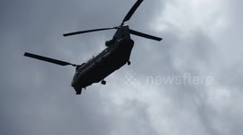 RAF helicopters continue to fly in emergency supplies to help reinforce the Whaley Bridge dam
