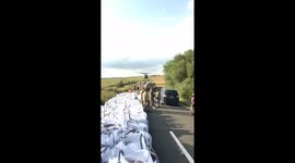 RAF Chinook captured picking up sandbags to take to Whaley Bridge dam