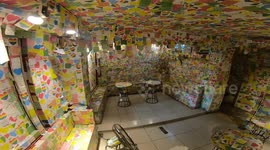 Unique cafe in Vietnam is completely covered in sticky labels with messages from customers