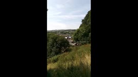 RAF Chinook adding cement to dam