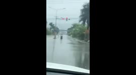 Hapless motorcyclist waits in completely the wrong place for traffic lights to change