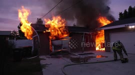 Home Heavily Damaged in Early Morning Structure Fire