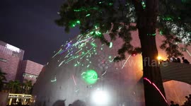 Protesters chant Hong Kong people add oil in Cantonese during a laser protest due to a student being arrested for buying laser pens