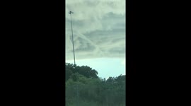 Bizarre funnel cloud appears over Florida highway