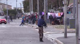 Cape Town cops fire rubber bullets upon protesters as the city is in lockdown