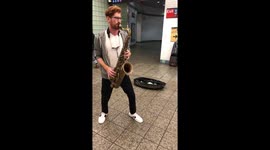 Dancing homeless man and Jazz player