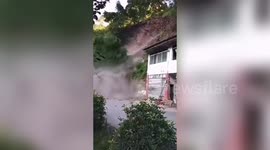 People flee when mud and trees tumble down mountain in China's Yanjin