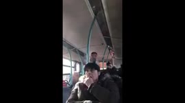 Shocking video shows two women landing blows on each other in the middle of a city bus in front of stunned passangers