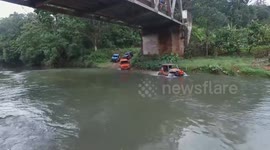 Bathing Offroad Cars on a Clear River in Summer