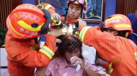 Firefighters free woman's hair from massage chair in China