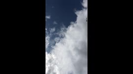 Clouds time-lapse portrait