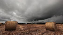Thunderstorm Over Bales Of Hay In UK - Time Lapse