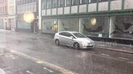 Heavy rain takes over the streets of London