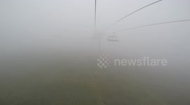 Fog in French Alps. View from the lift