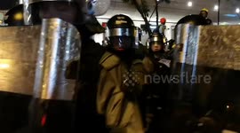 Riot police use pepper spray against protesters in Hong Kong