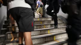 Riot Police chase protesters up steps to Kwun Tong MTR station