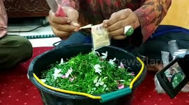 cow make up ceremony before slaughtering