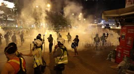 Hong Kong police fire tear gas at protesters outside Kwai Fong Police Station