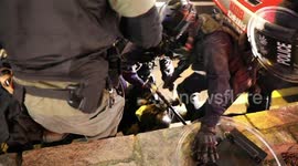 Hong Kong riot police filmed in heavy-handed arrest of young demonstrator