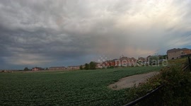 Rainbow over field timelapse