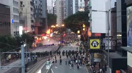Hong Kong riot police fire teargas at protesters outside central HQ