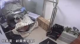 Out of control minibus steams across road and crashes through bank in southern China