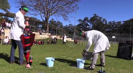 Australian science teachers amuse students with giant cola-powered rocket launch