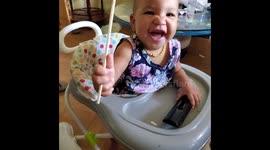 Adorable baby laughs uncontrollably having epic 'sword fight battle' with dad