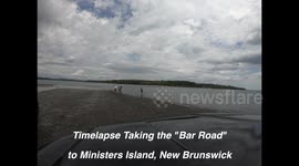 Time-lapse of ocean bed road appearing and giving access to Ministers Islands, New Brunswick