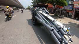 Cargo car in Vietnam seems to be carrying everything including kitchen sink