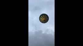 Hot air balloon flying over my house very low.