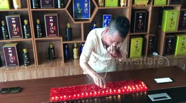 Kung fu master blows out 120 candles using EARS