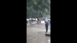 Ingenious way to cross a flooded road