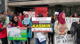 Hundreds gather outside United Nations headquarters in New York to protest India's intervention in Kashmir