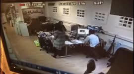 Girl falls off desk at work