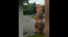 TRex Greets Kids at Bus Stop