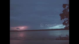 Lightning chases pelican